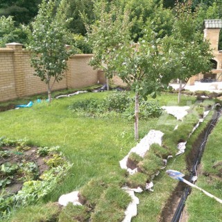 Траншеи для полива по существующему газону